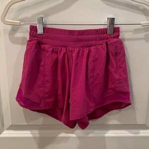Women’s lululemon athletic shorts. Dark pink. Size 2 with 4” inseam.